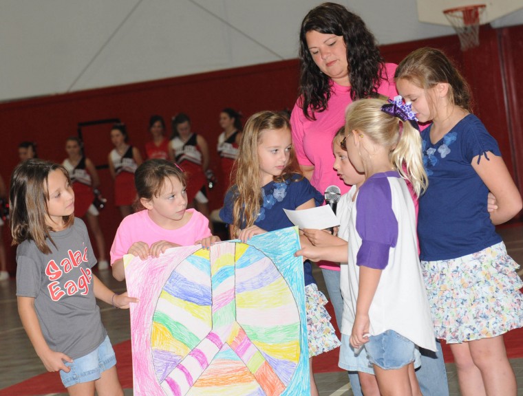 Adopted school gives back to deploying “Long Knife” unit